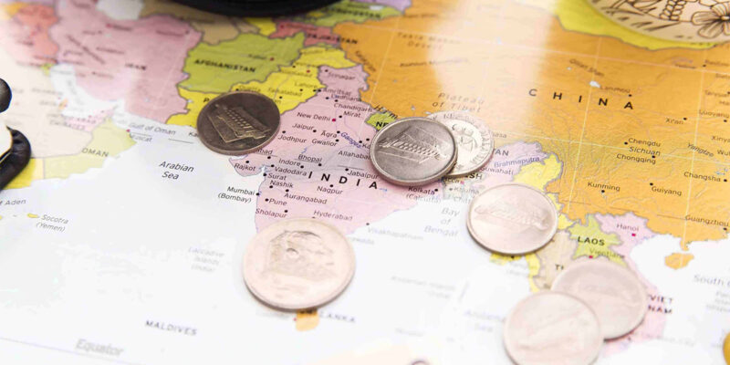 Coins on a world map